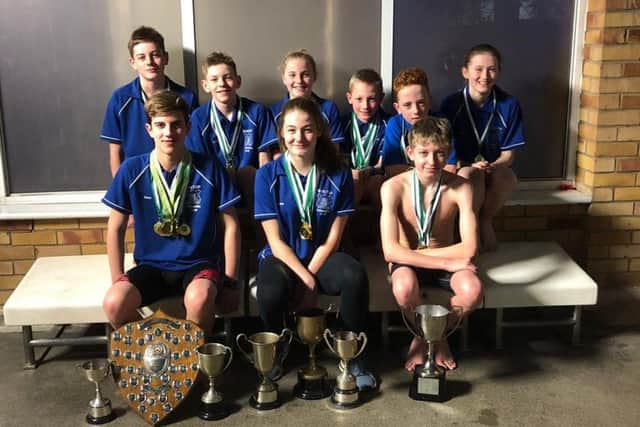 Pictured are: Back row, from left -Thomas Bruce, Alfie Bisby, Evie Garrard, Oscar Goldsmith, Stefano Fiore, Elizabeth Burt; Front row - Rico Bringeman (junior champion) Kieva Clegg (champion), Joseph Vickers (junior champion).