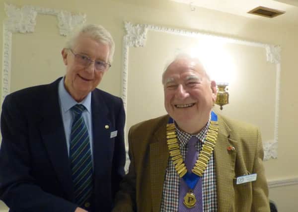 Outgoing Chairman Peter Williams handed the Chain of Office to incoming Chairman Keith Kelsey