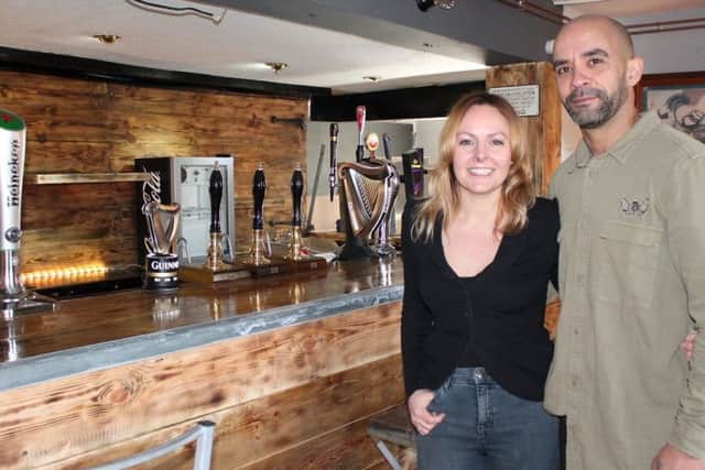Husband and wife team, Gemma and Marlon Jones, inside the Boars Head pub in Newmarket.