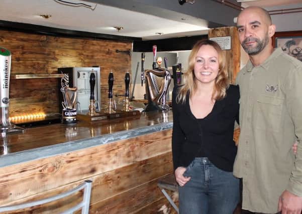 Husband and wife team, Gemma and Marlon Jones, inside the Boars Head pub in Newmarket.