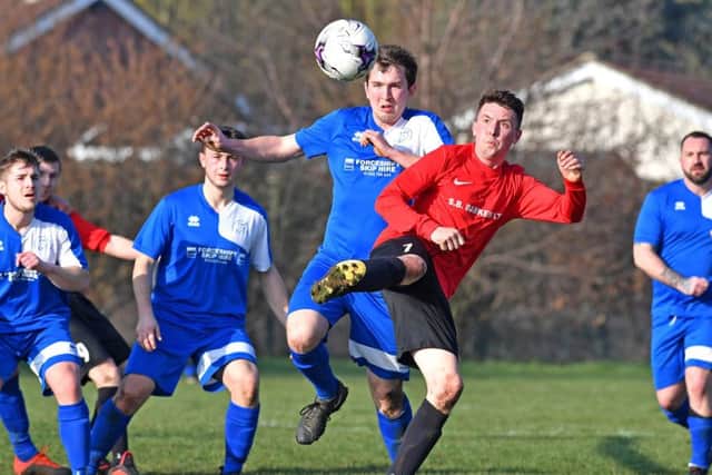 Coningsby v Swineshead action: Keiran Rose Swineshead (blue) Sam Owen Coninsgby (Red)