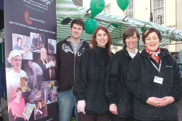 Boston College representatives in Boston's Market Place 10 years ago.