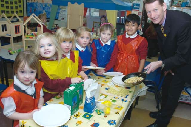 Pancake making at Boston West Primary School 10 years ago.