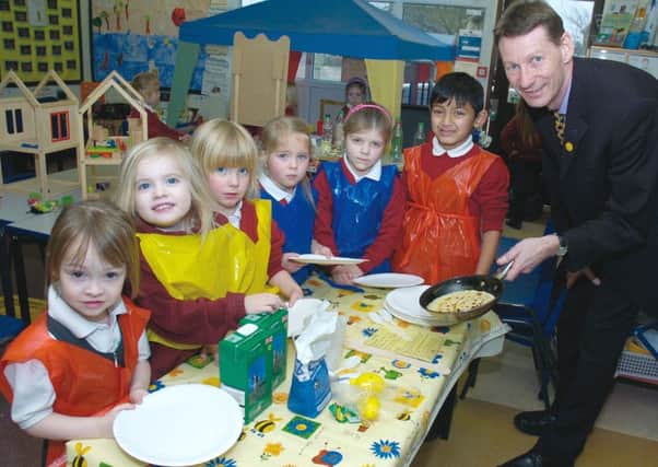 Pancake making at Boston West Primary School 10 years ago.
