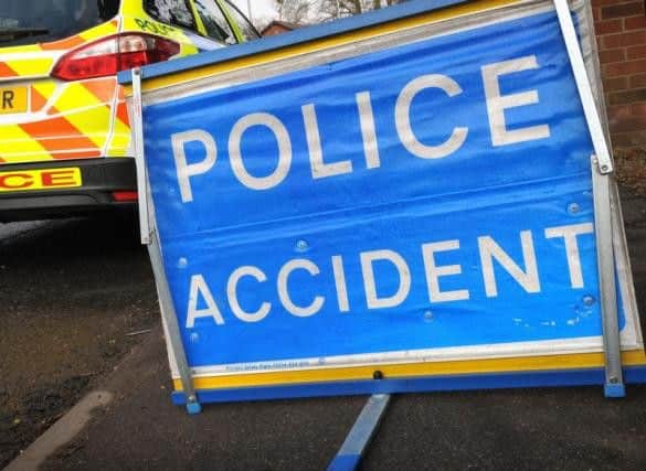 Firefighters helped one casualty out of the crashed vehicle at Dunston.