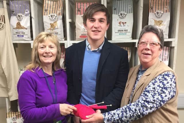 Lynn Peak, marketing assistant Mitchell Pearson, and Sue Adams, from Laughing Dog Food near Boston.