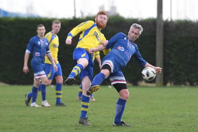 Fosdyke Res (blue) v Park Res (yellow). Marvin Jolly (blue), Josh Stanley (yellow)
