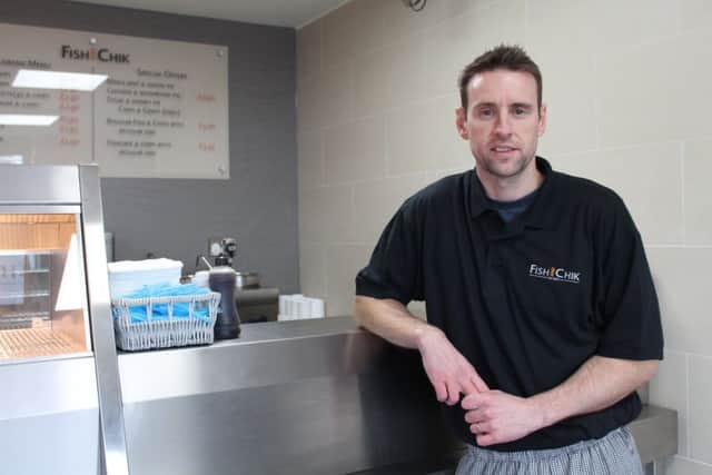 Tristan Libell at his fish and chip shop.