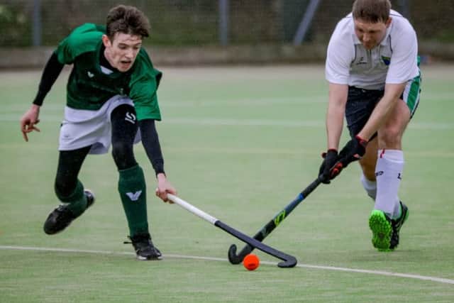 John Medlar battles for possession EMN-190403-172410002