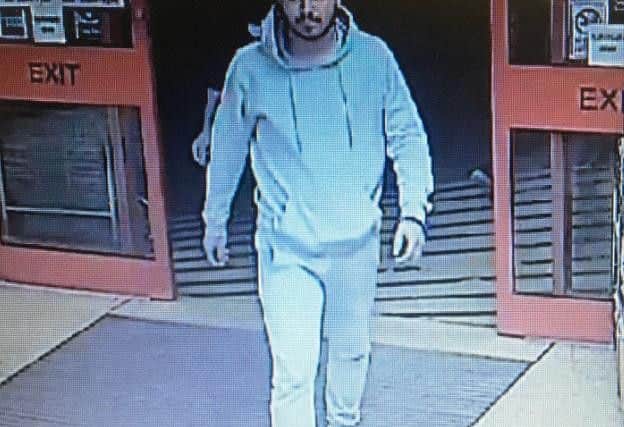 Police want to talk to the men and women in the CCTV images in relation to a theft from Boston's Iceland