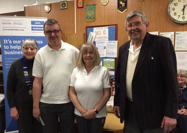 President Jill King is pictured presenting the winners of the Bowls Gala competition with their prize. From left are Jill King, Keith Taplin, Jayne Taplin and John Scholey.