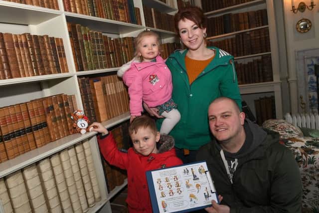 The Tiger who came to Tea event at Gunby Hall. Philip Smith and Amii Patrick-Smith with Link Smith 4 and Phoebe Smith 2 doing the Tiger Hunt. EMN-191103-091925001