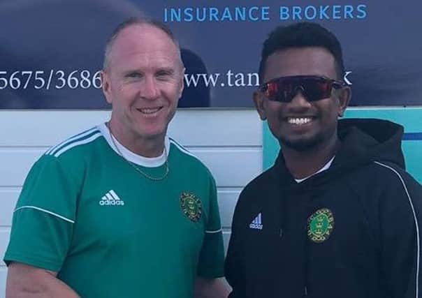 Chris Wade with last year's pro Ishan Jayaratne.