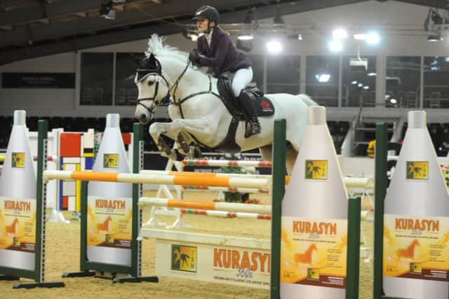 Holly and Rexter DOr on their way to another clear round EMN-190703-154057002