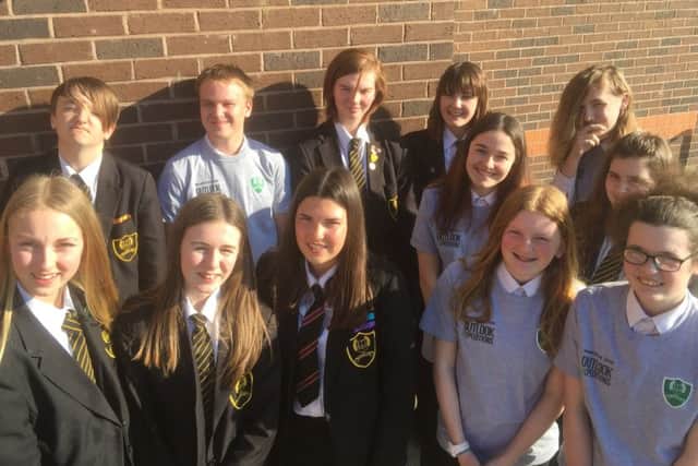 Expedition students, some sporting their t-shirts sponsored by Nationwide Student Uniform
