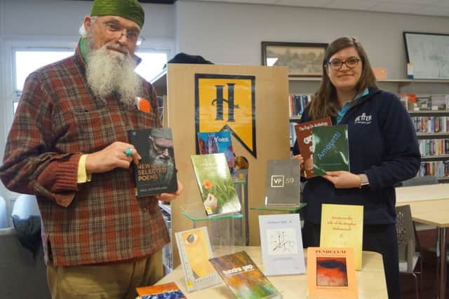 Author Paul Sutherland with Market Rasen Library manager Georgina Carr EMN-190803-122238001
