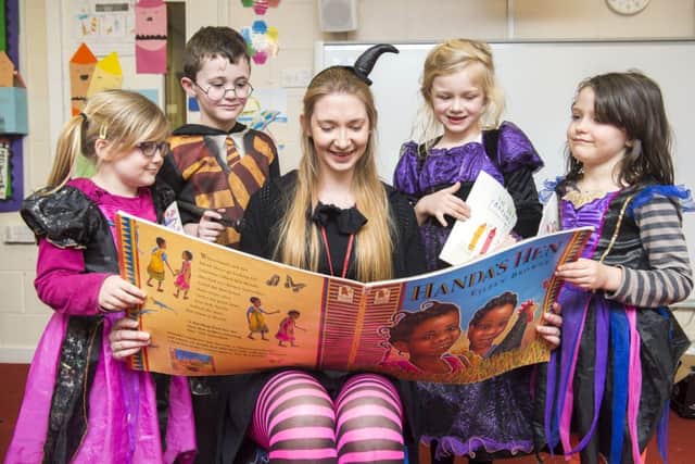 Year One pupils Phoebe Gill, Cameron Harvey, Olivia Randle and Elissia Alan enjoy an exciting story at Theddlethorpe Academy.
