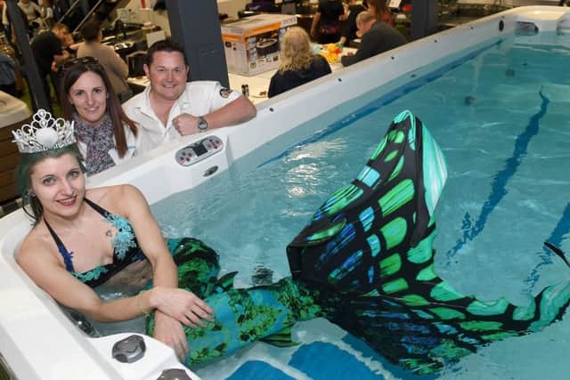 1Stop Spas, Billinghay. Tenth anniversary open event. Owners Chris and Melissa Brady with Laura Hudson (Mermaid Twinkle) of Donington, Miss Mermaid Lincolnshire, England and Uk. EMN-190403-101949001
