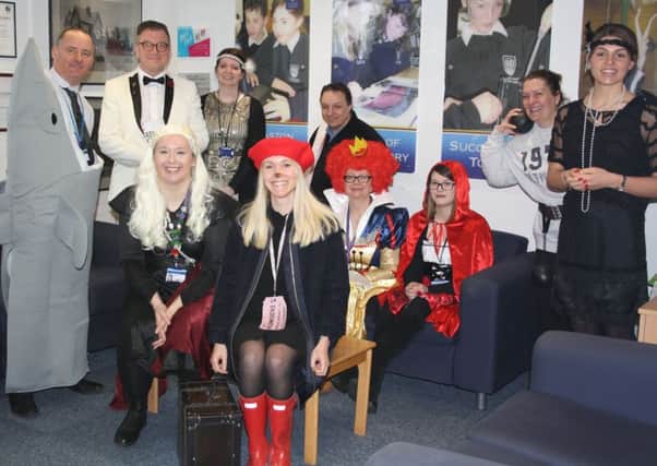 Staff at De Aston School dressed for World Book Day EMN-191103-081117001
