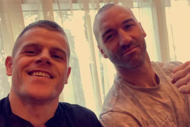 Best of enemies? Johnson, left, and Monaghan posed for a selfie after finding themselves sat next to one another waiting for their weight in.