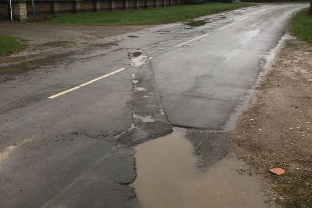 Pitted - potholes are getting worse and they are being overlooked by the reporting system, claims Craig Wood from Burton Pedwardine parish meeting. EMN-190319-133213001