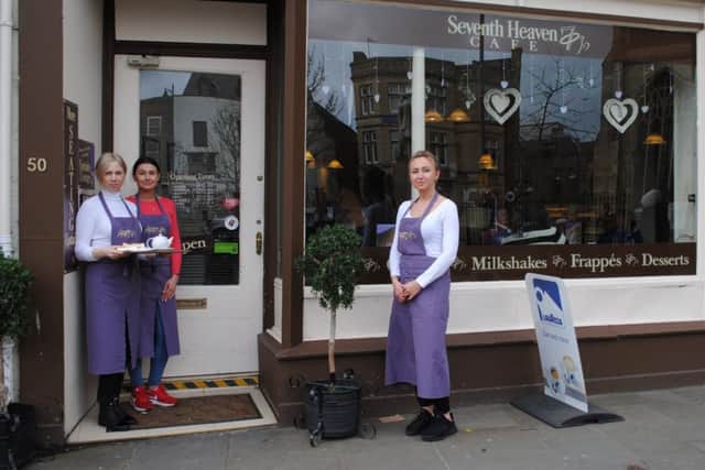 Pictured (from left), Seventh Heaven owner Karolina Rusin and waitresses Angelika Kulczycka and Marta Malicka.