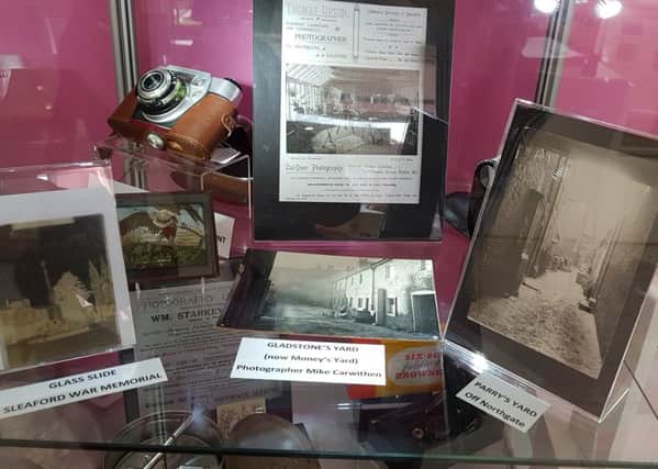 The local photography display in Sleaford Museum. EMN-190316-105739001