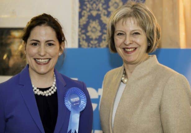 Victoria Atkins MP with then-Home Secretary Theresa May in 2015.