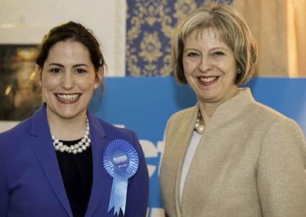 Victoria Atkins MP with then-Home Secretary Theresa May in 2015.