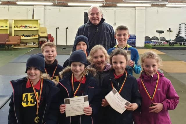 The BADAC prizewinners with club representative Richard Anderson.