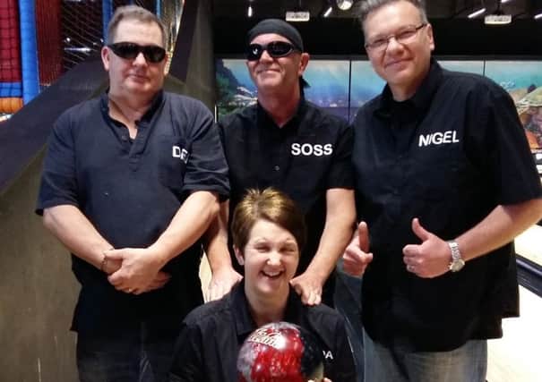 Derek, Belinda, Soss and Nigel at the bowling alley.