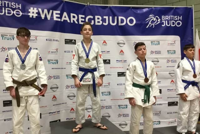 Ethan Steele on top of the podium.