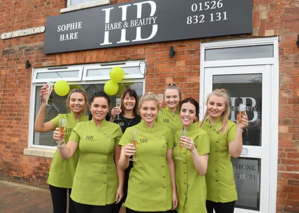 Hare and Beauty move to new premises. L-R Libby Edwards, Sophie Parslow, Amanda Hare, Sophie Hare - owner, Maisie Cox, Amy Taylor, Brooke Sorrell. EMN-190318-091253001