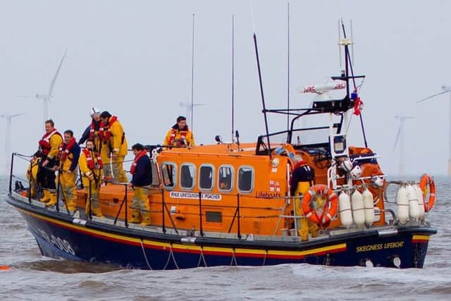 Skegness RNLI Lifeboat wqas launched to reports of a person in the water approx 200m out to sea from the beach at the boat compound at South Parade car park ANL-190321-080335001