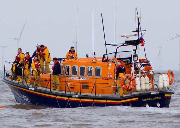 Skegness RNLI Lifeboat wqas launched to reports of a person in the water approx 200m out to sea from the beach at the boat compound at South Parade car park ANL-190321-080335001