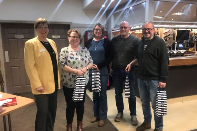 The winning team, Safety First Training Services, of Boston, with quiz master Katherine Bunting, partner at Chattertons (far left).