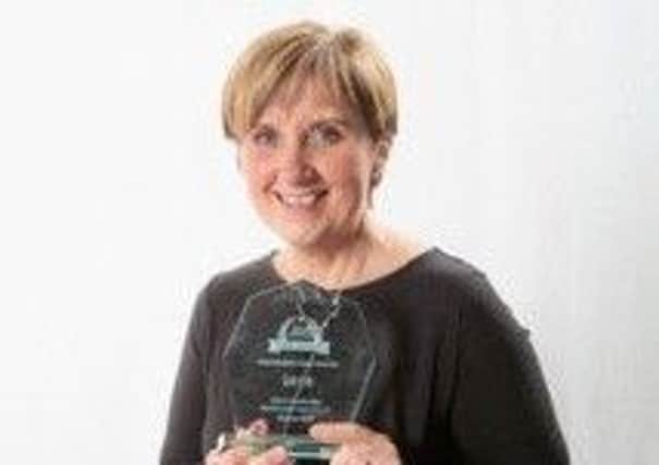 Karen Bell with her award