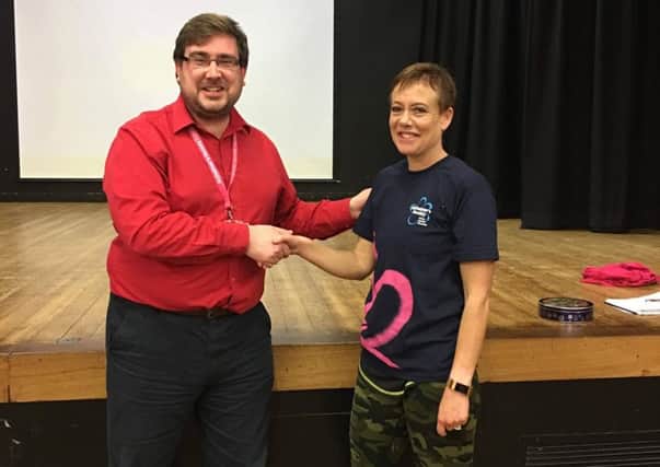 Sarah Marwood is pictured with Oliver Larkin, Community Fundraiser for Lincolnshire at Alzheimer's Society. EMN-190322-153914001
