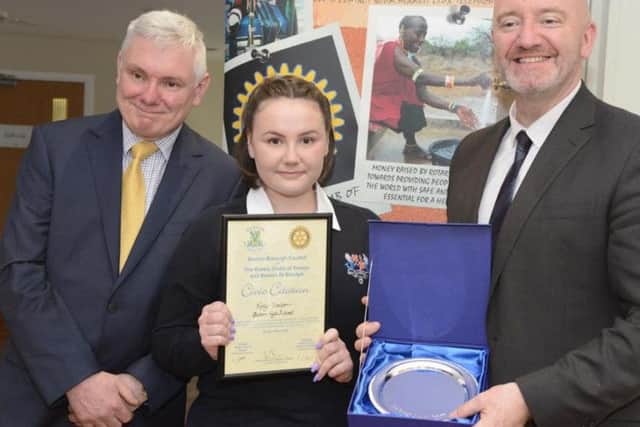 Mollie Trevor receives her award