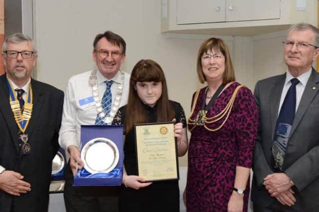 Millie Skinner receives her award