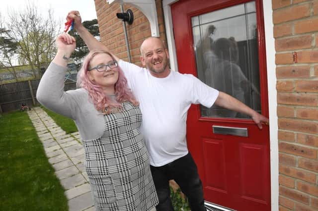 Sherelyn Russell and Tony Pigram who have been living in their car sine February, get keys to a flat in Coningsby ANL-190325-113330001