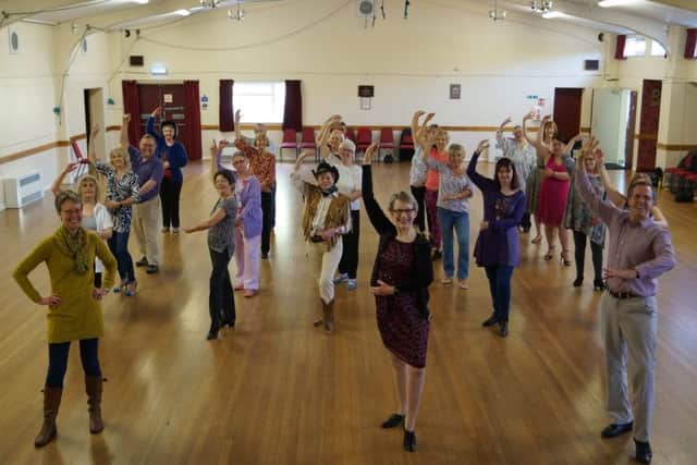 Latin-in-Line has proved a popular class. Leading the way are Heather and Peter Davies, with Nicola Marshall, left. EMN-190204-081841001