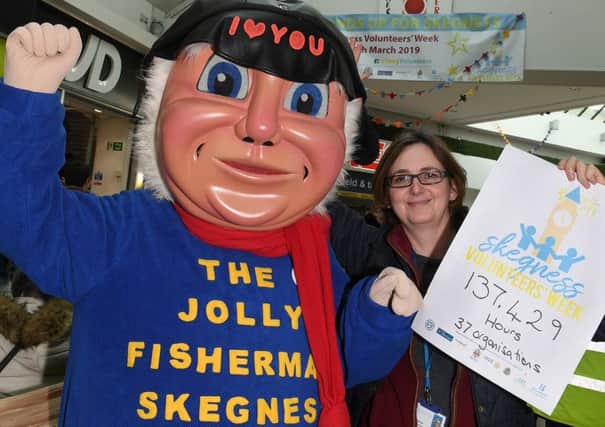 Skegness Mayor unveils a Volometer at Hildreds. Kathryn Laverack of Lincolnshire CVS with Jolly Fisherman. ANL-190325-121415001