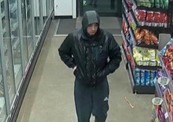 Police would like to speak to this man in connection with a theft at Asda in Skegness, ANL-190104-092335001