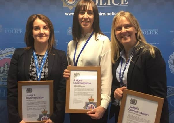 Awarded for their part in solving a case of police officer impersonation fraud. From left: Pc Kate Wood, Financial Investigator Jemima Cholmondeley-Smith, DS Kara Nicholson EMN-190104-105026001