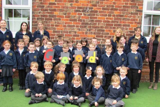 Staff and students celebrate the schools Good Ofsted report earlier this month.