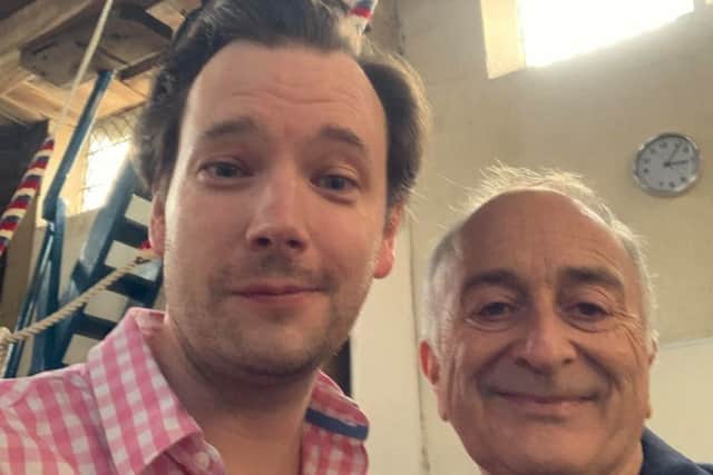 St James' Church bell-ringer Alastair Meiklejon with Sir Tony Robinson.