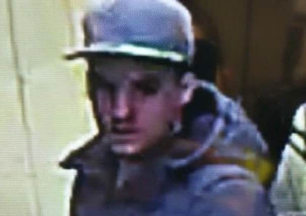 Police say this man may be able to help them with their enquiries into a purse theft in Sleaford. EMN-190104-154614001