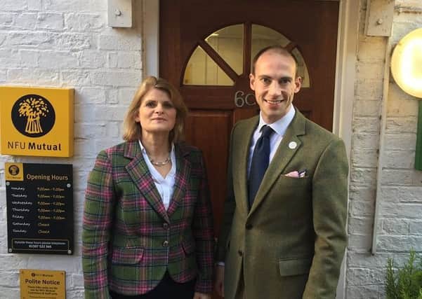 Jayne Thornalley and Andrew Wilson outside the NFU Mutual branch in Horncastle