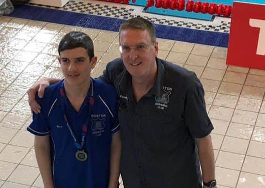 Rico Bringeman and coach Ian Wells.